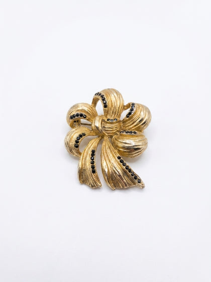 BROCHE AMERICANO