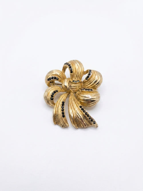 BROCHE AMERICANO